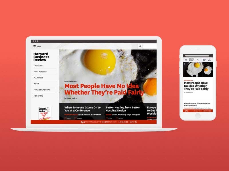 A mock-up of the HBR.org homepage on a laptop and mobile device, side-by-side.